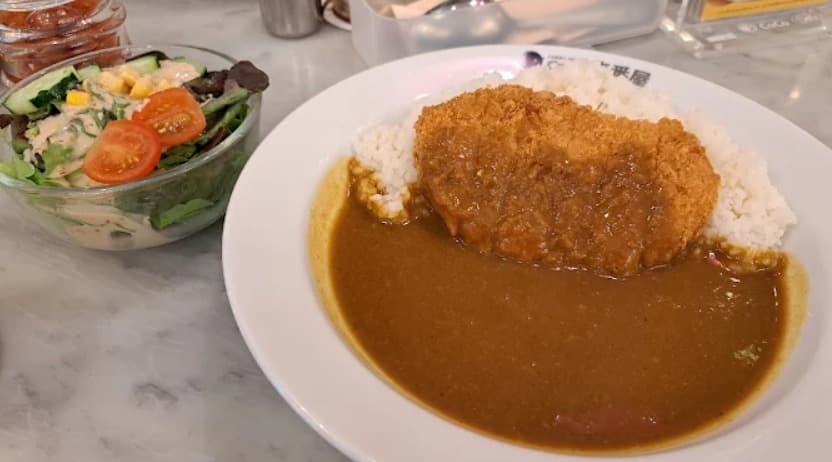 料理：サクッと揚げられたCoCo壱番屋 エムクオーティエのポークカツカレー